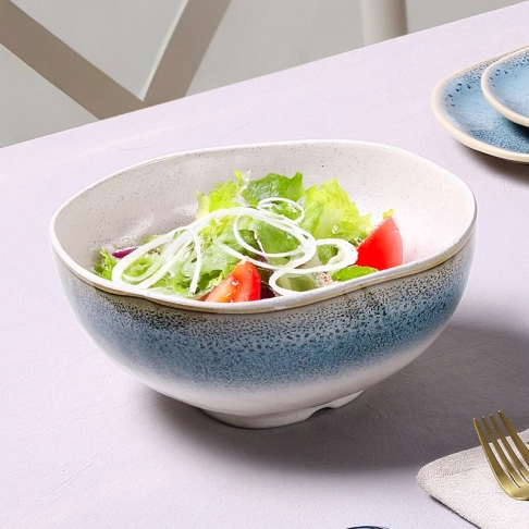 Salad bowl with salad spoon fork