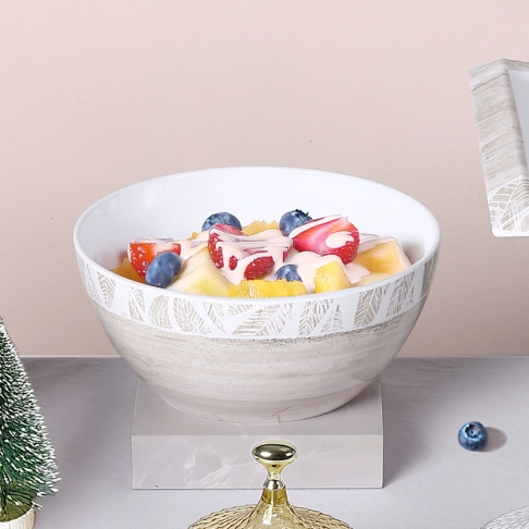 Salad bowl with salad spoon fork