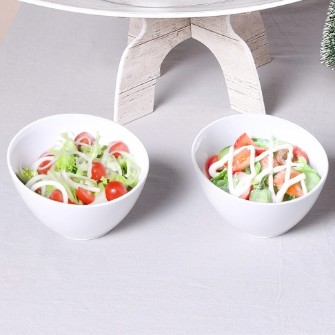 Salad bowl with salad spoon fork