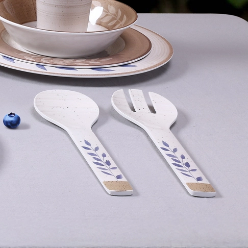 Salad bowl with salad spoon fork